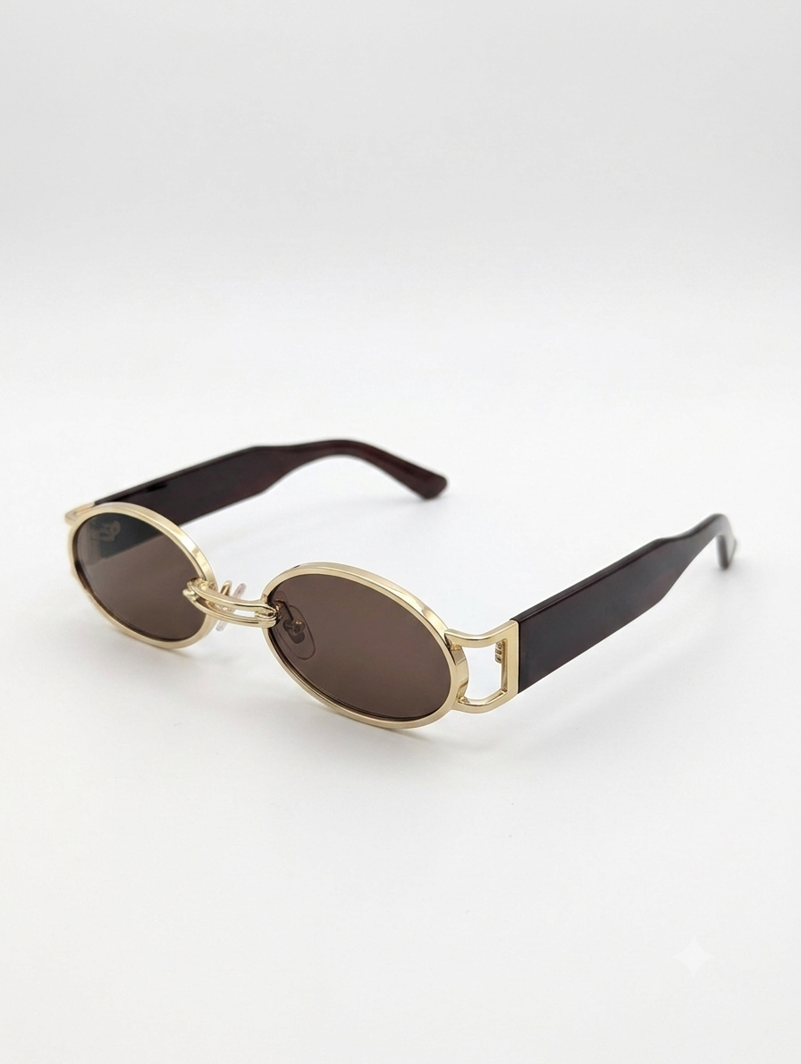 Lumina Manor Vintage Luxe sunglasses with gold metal frame and brown lenses angled view.